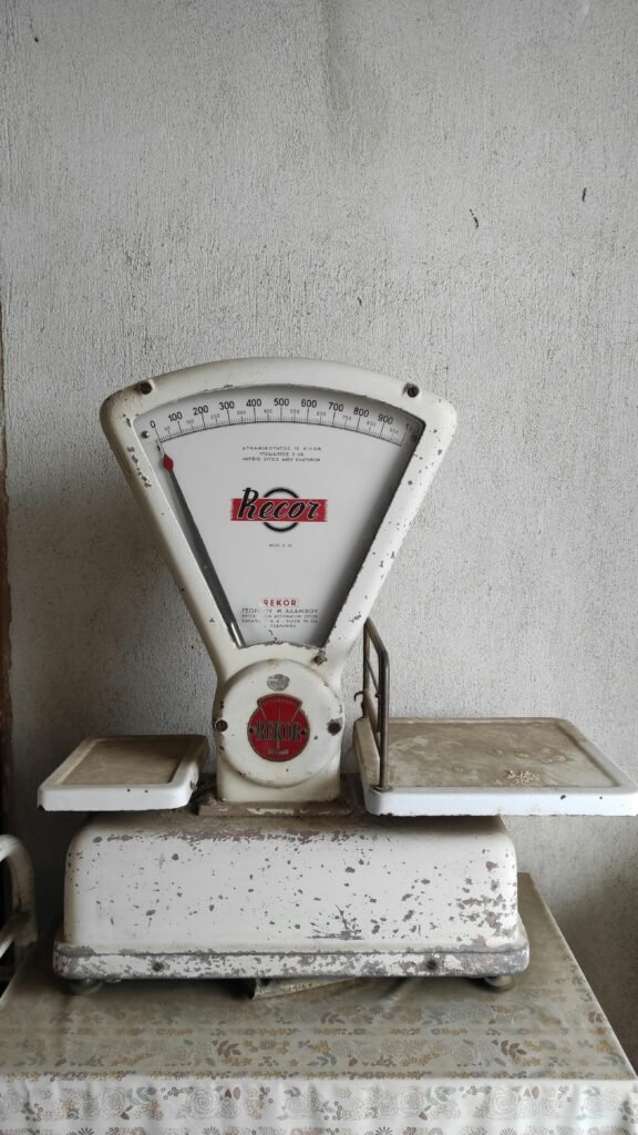 Old-fashioned weighing scale with rust in Serres, Greece. Perfect for vintage style projects.